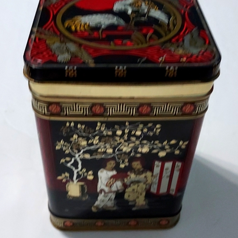 Asia Square Tin, Container Made in England. Size 5 3/4 H x 3 3/4 W.